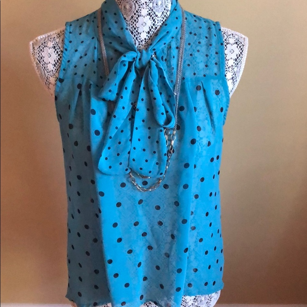 Teal and black polka dot hi-lo sleeveless blouse